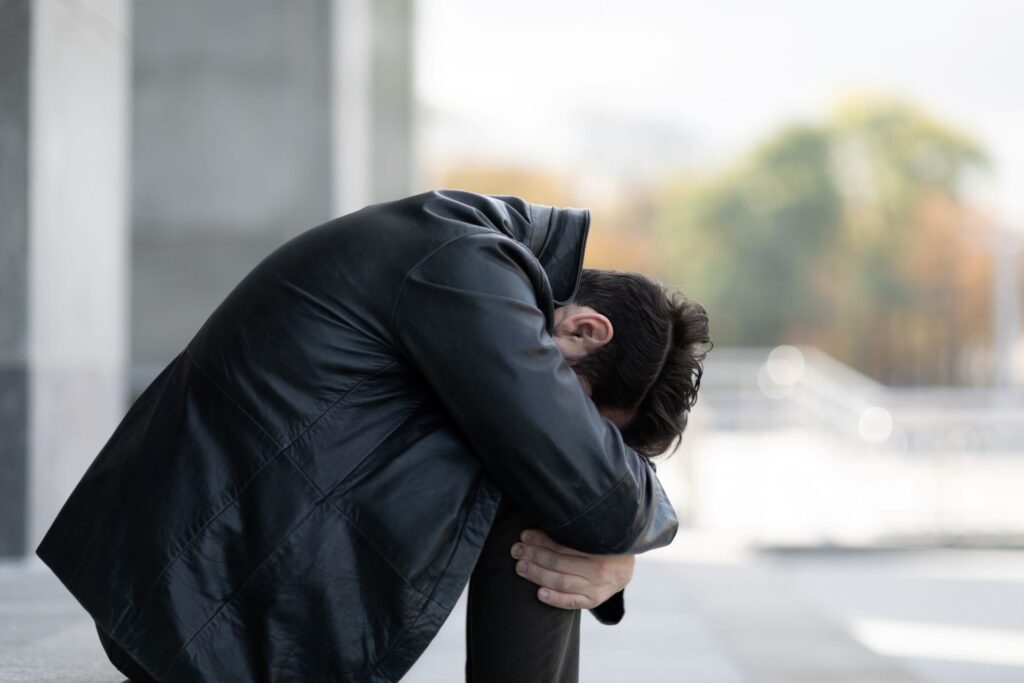 portrait of a man in the moment of panic attacks